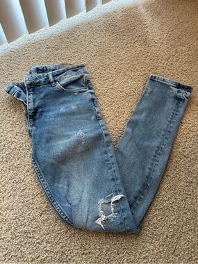 ASOS Light Blue Skinny Jeans with Distressed Knees